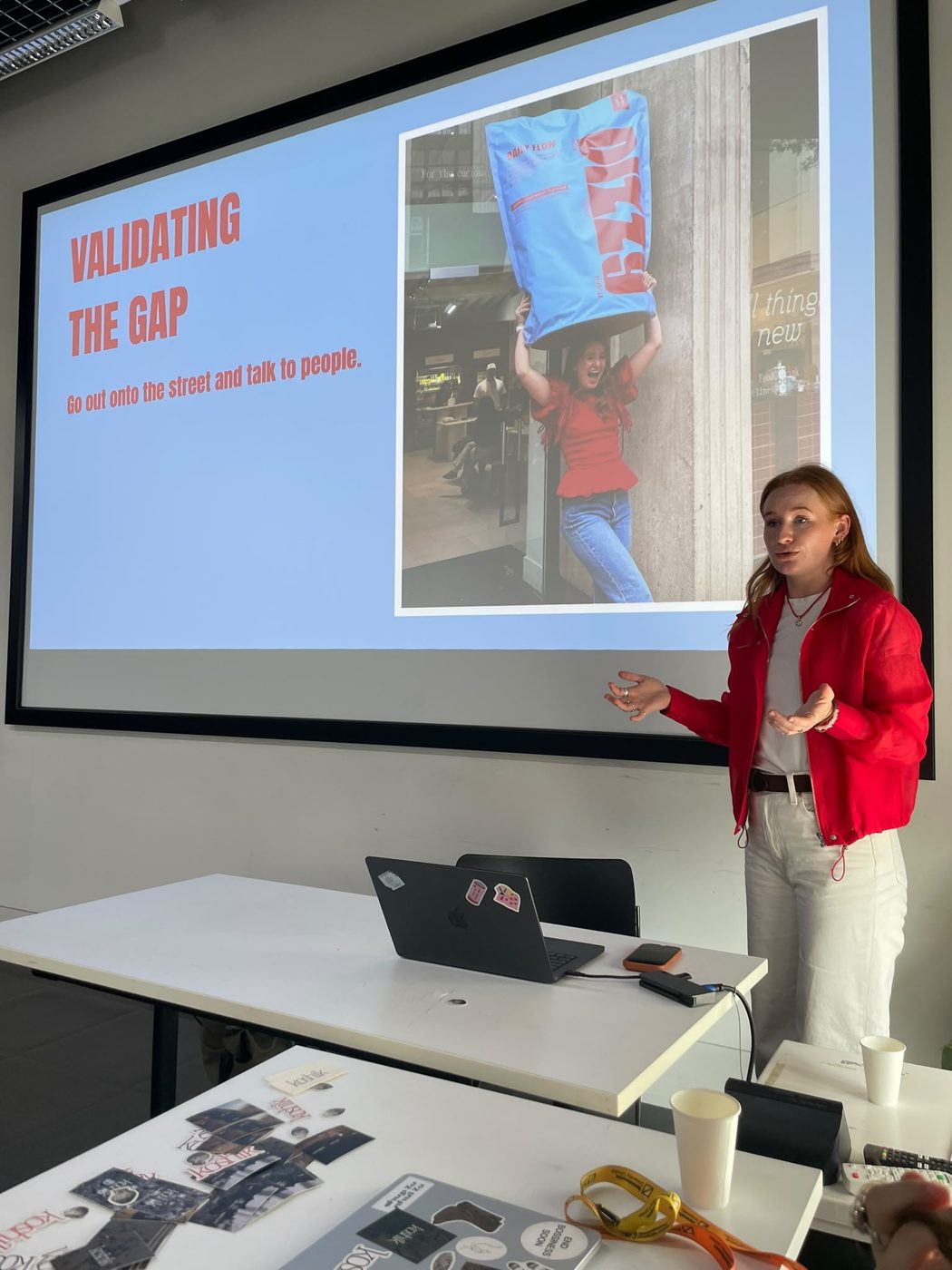 Claudia presenting a talk on validating the gap in the market